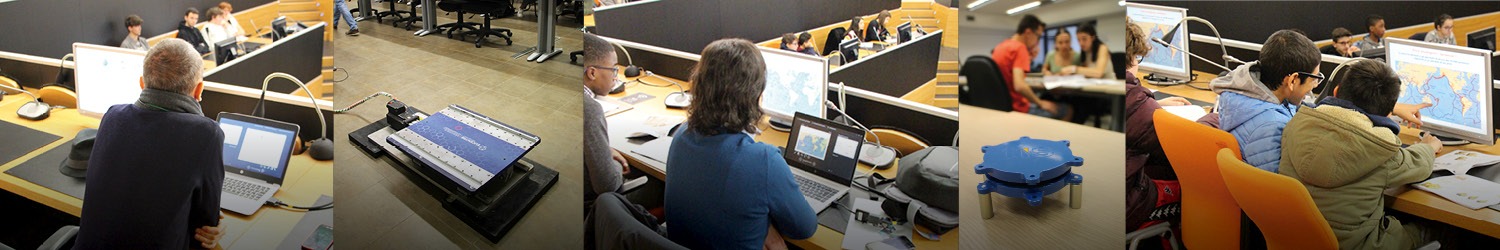 Some students sitting in front of a computer during a lesson on seismic risk at Eucentre.